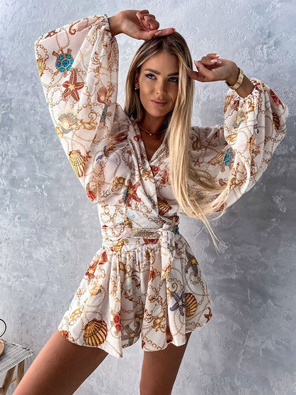 Floortje | Flowing Playsuit with Tropical Print and Kimono Sleeves