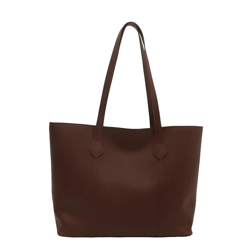 Elegant Women's Shoulder Bag with Sturdy Handles and Spacious Design