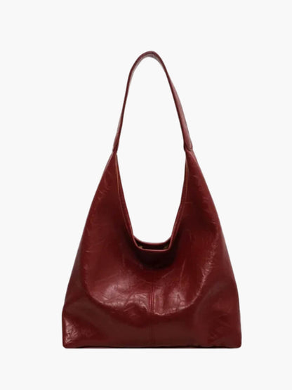 Elegant comfortable women's shoulder bag with zipper